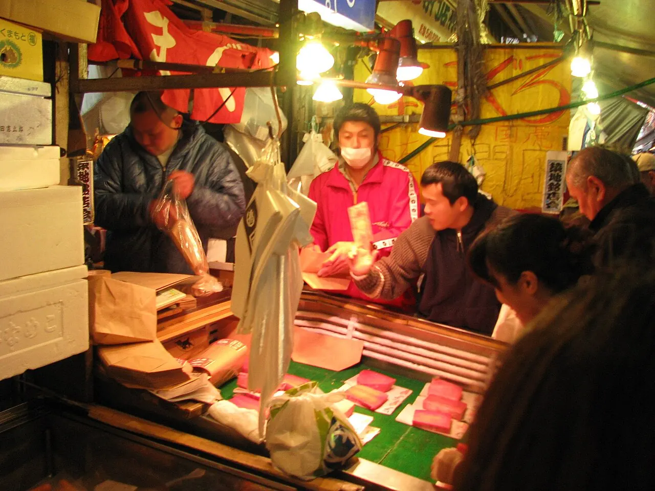 Stallholders at work in the Tsukiji Outer Market, Tokyo